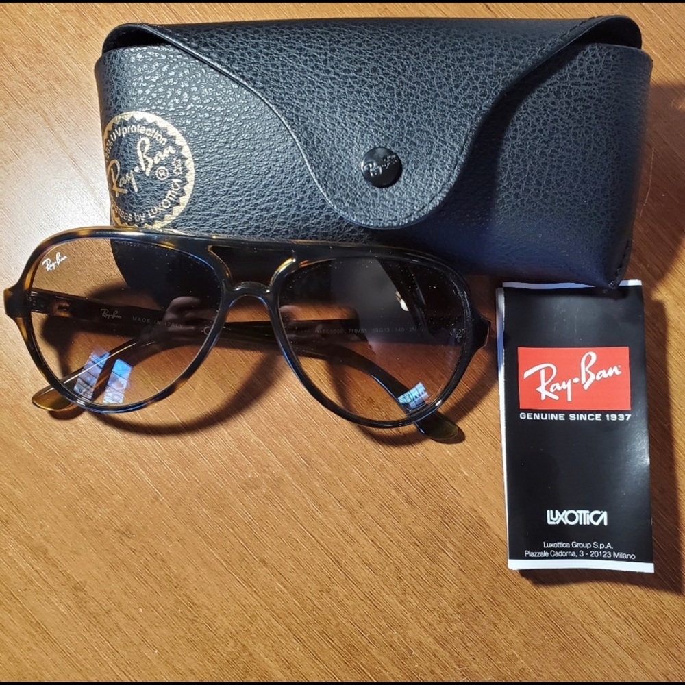 Lightly used, no scratches on lenses! Always kept in case!